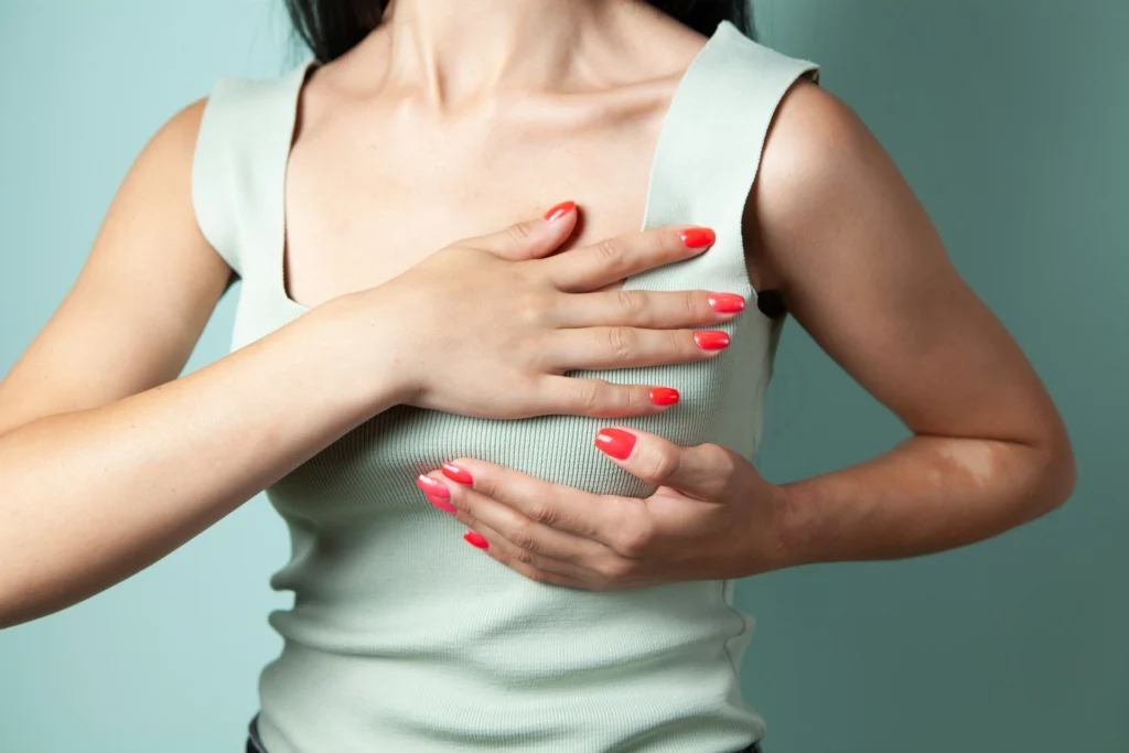 A woman experiencing chest tightness.
