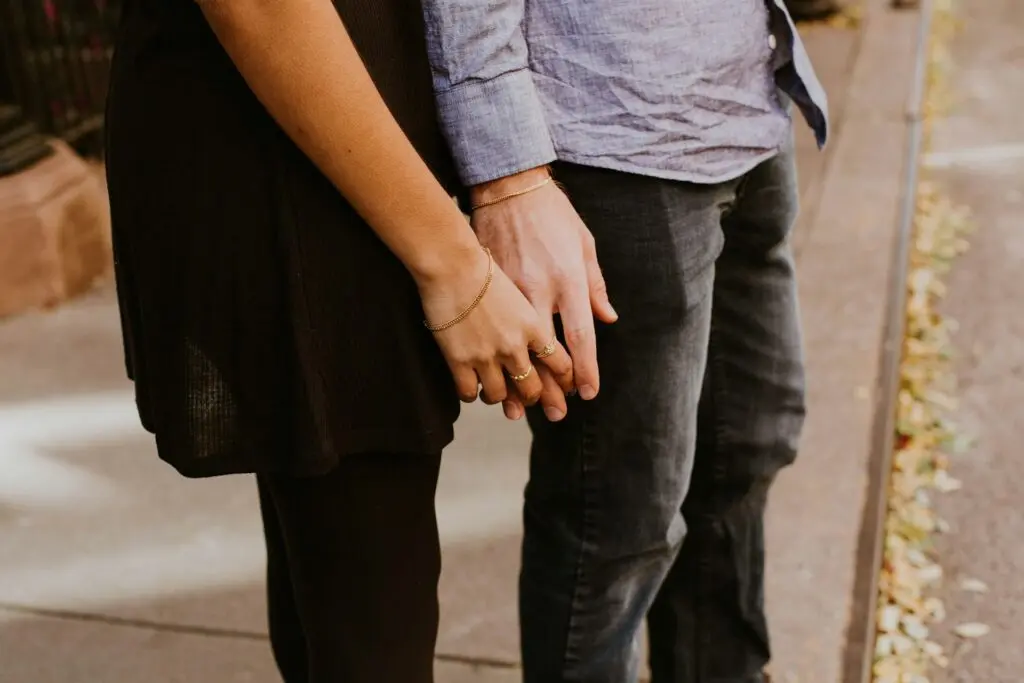 A couple holding hands