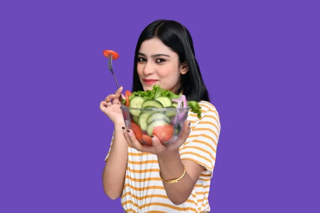 Woman holding a salad bowl