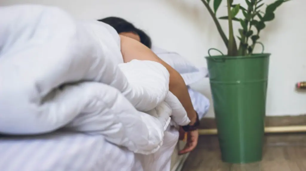 what is morning sickness - a woman on bed