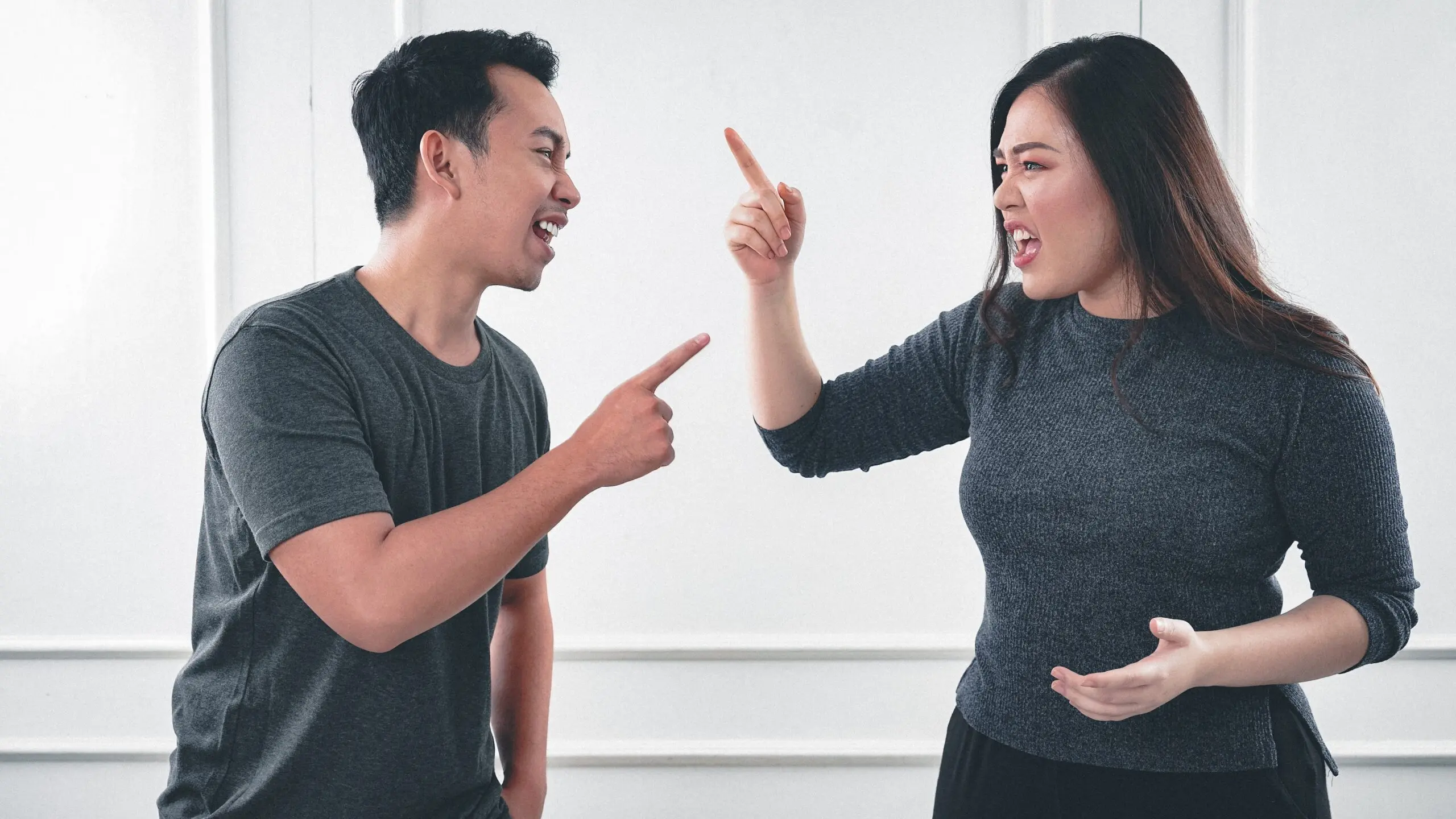 man and woman fighting