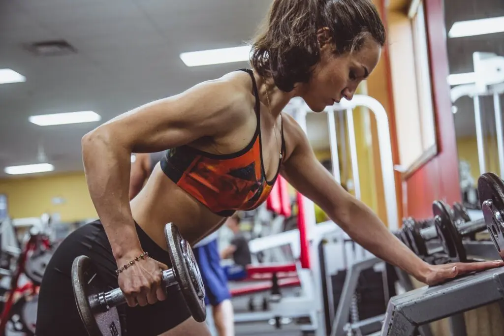 A woman working out in the gym.
