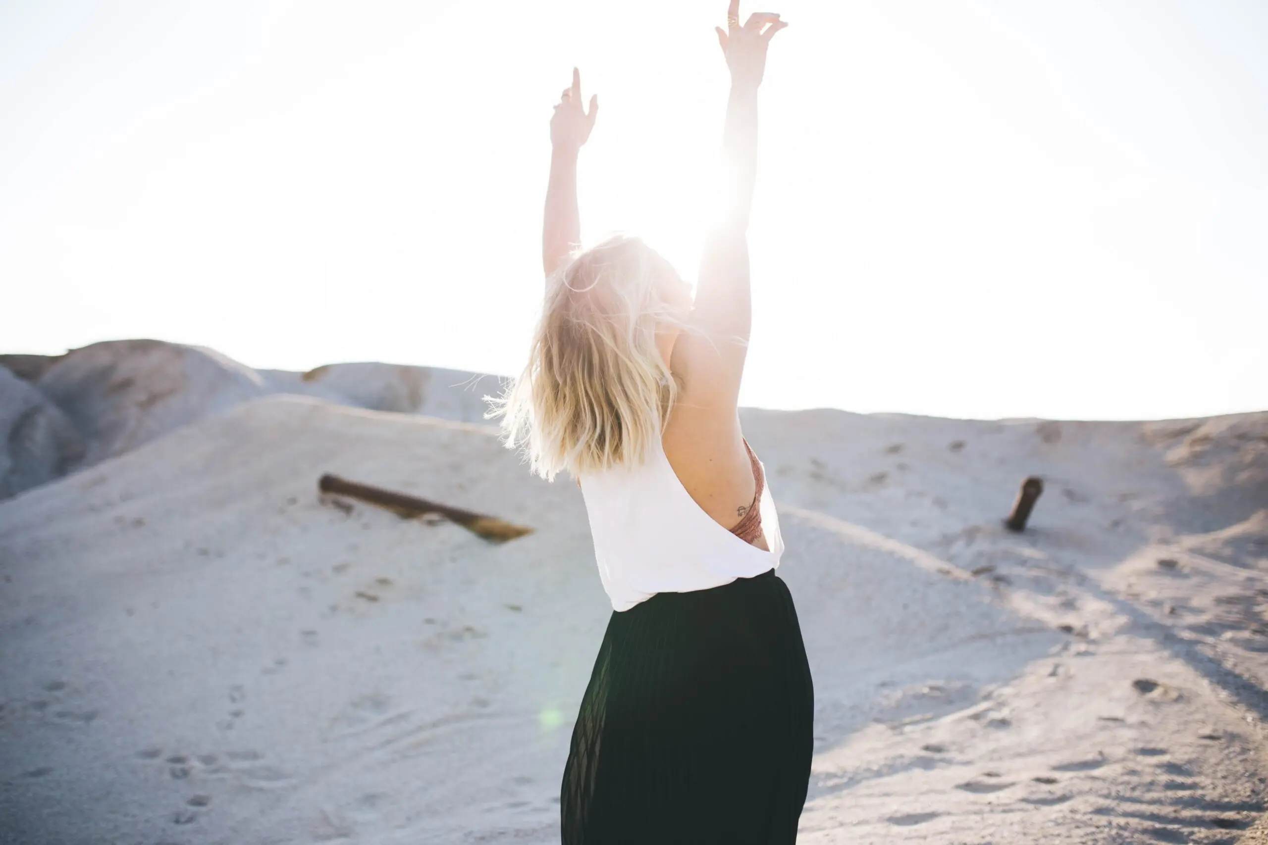 woman with hands up