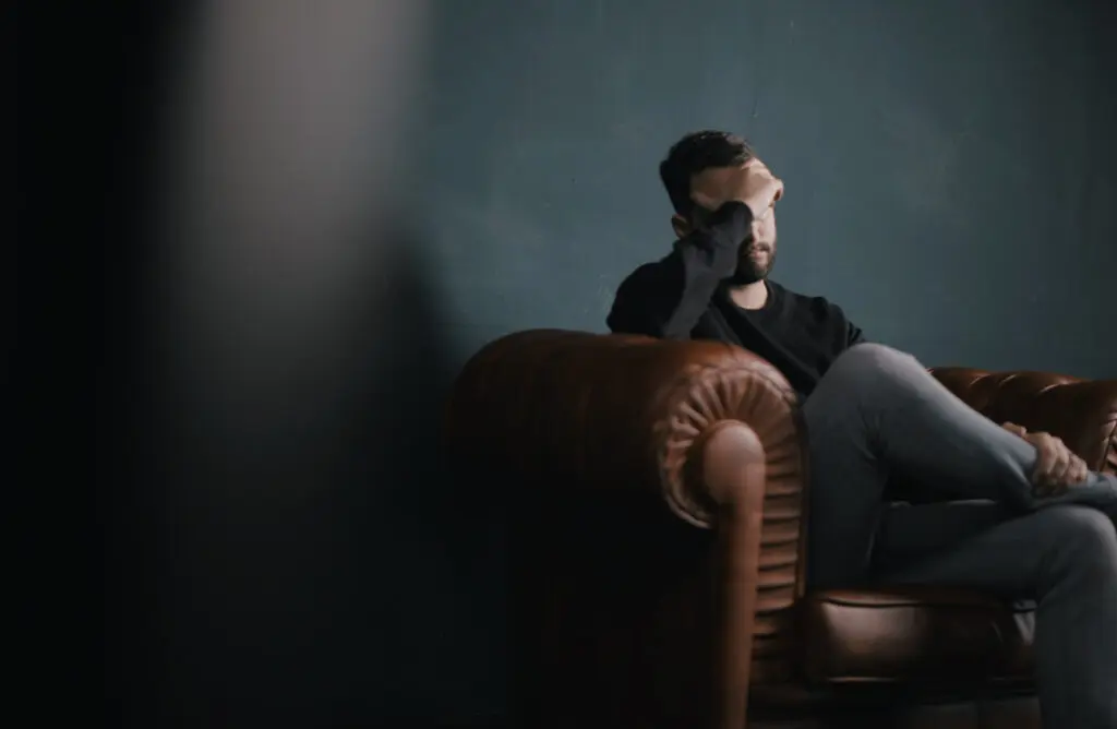 stressed person on a couch
