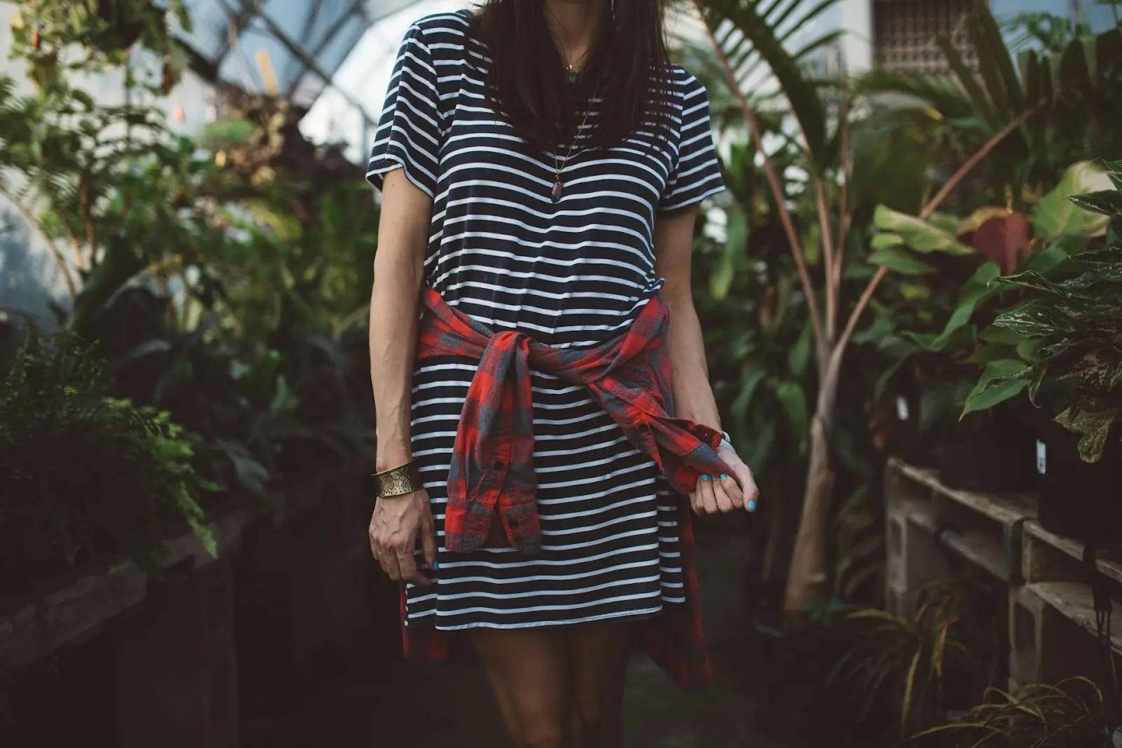 a person alone, holding on to a flannel