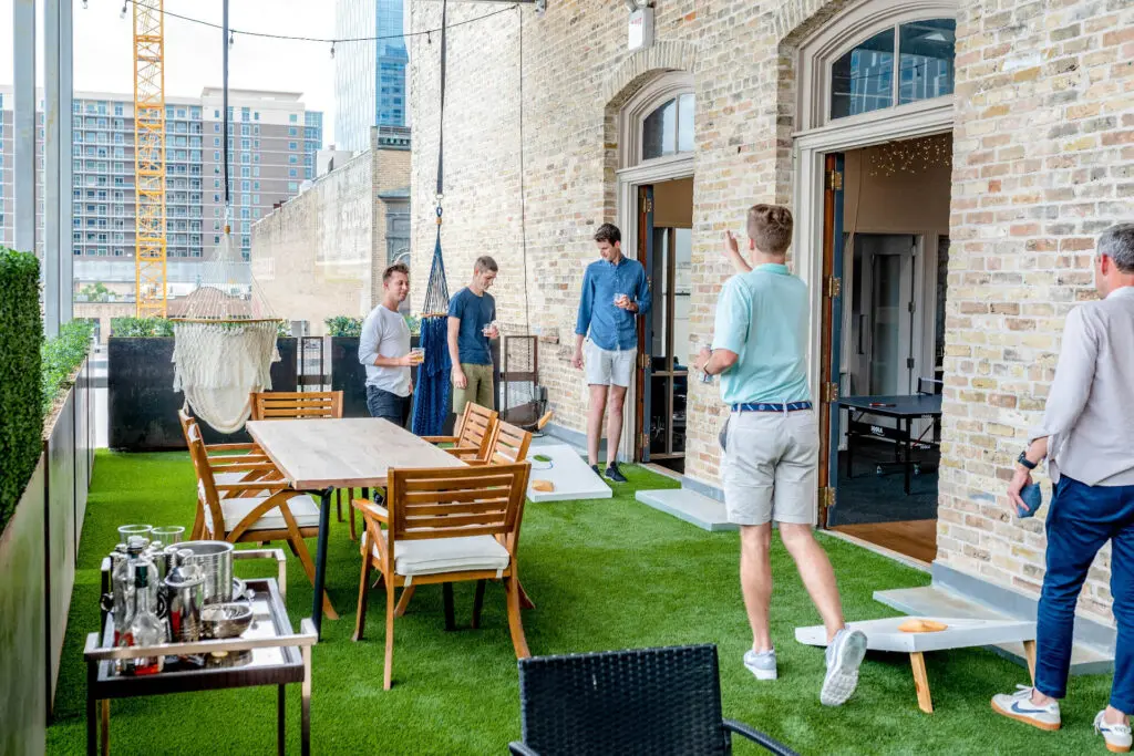 people playing cornhole