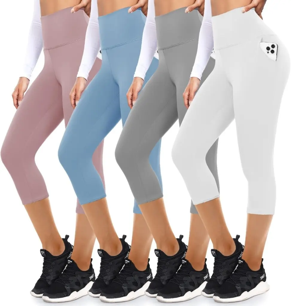 Four women stand in the same black tennis shoes and calf-length, high-waisted leggings. The leggings are in four different colors and each woman has a smartphone in their pocket.