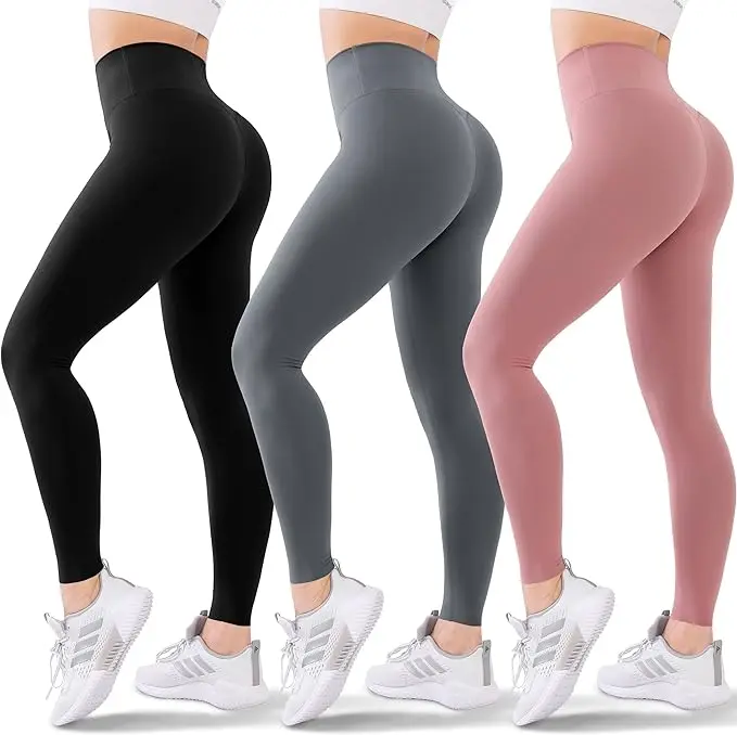 Three women stand on their toes in high-waisted, ankle-length leggings in three different colors.