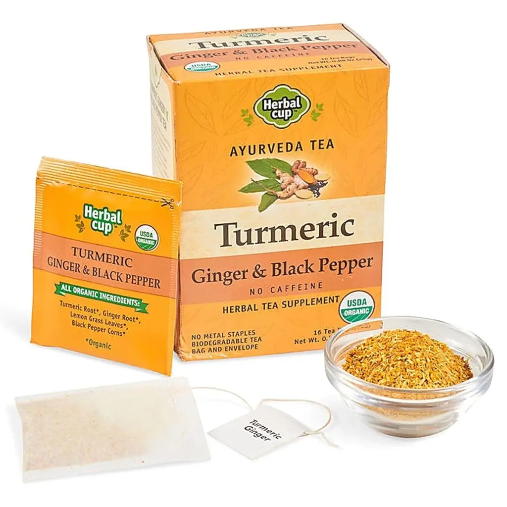 A box of Herbal Cup Ayurveda Ginger, Turmeric, Black Pepper Tea against a white background.