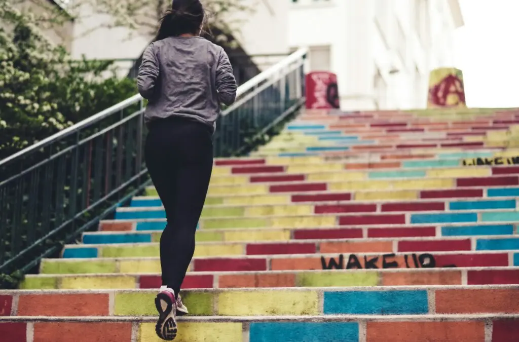 Woman running up stairs