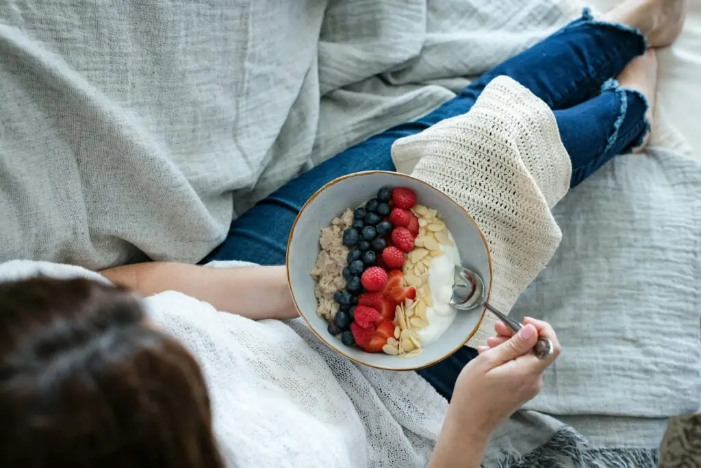 Yogurt Topped With Fruit in a Bowl