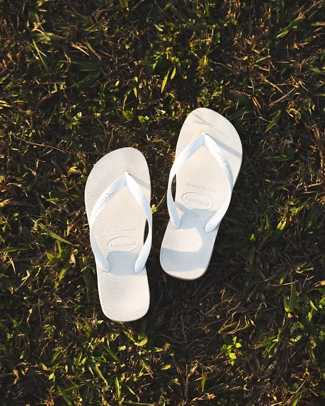 A pair of flip-flops on grass