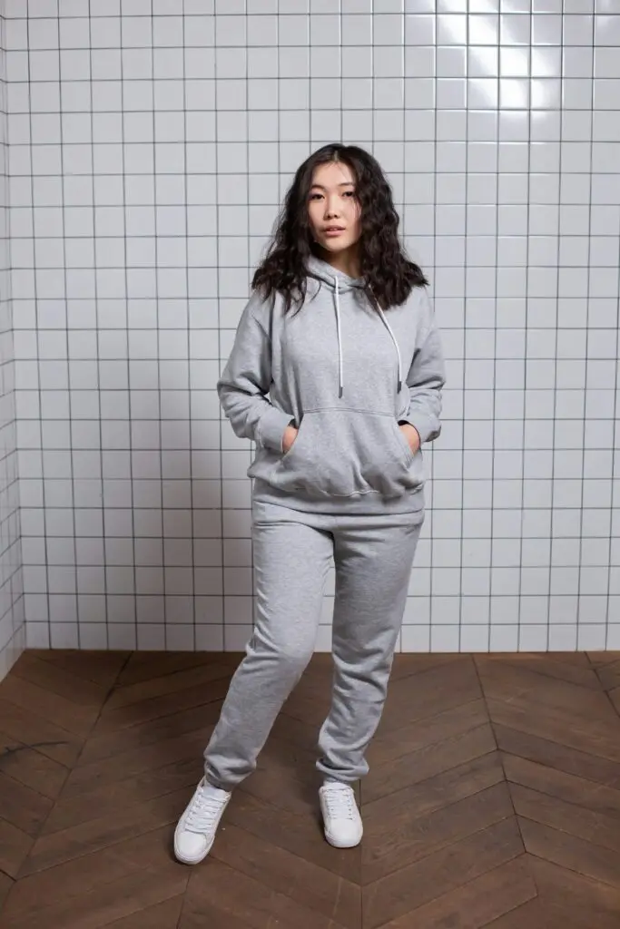 A woman in jogger sweatpants