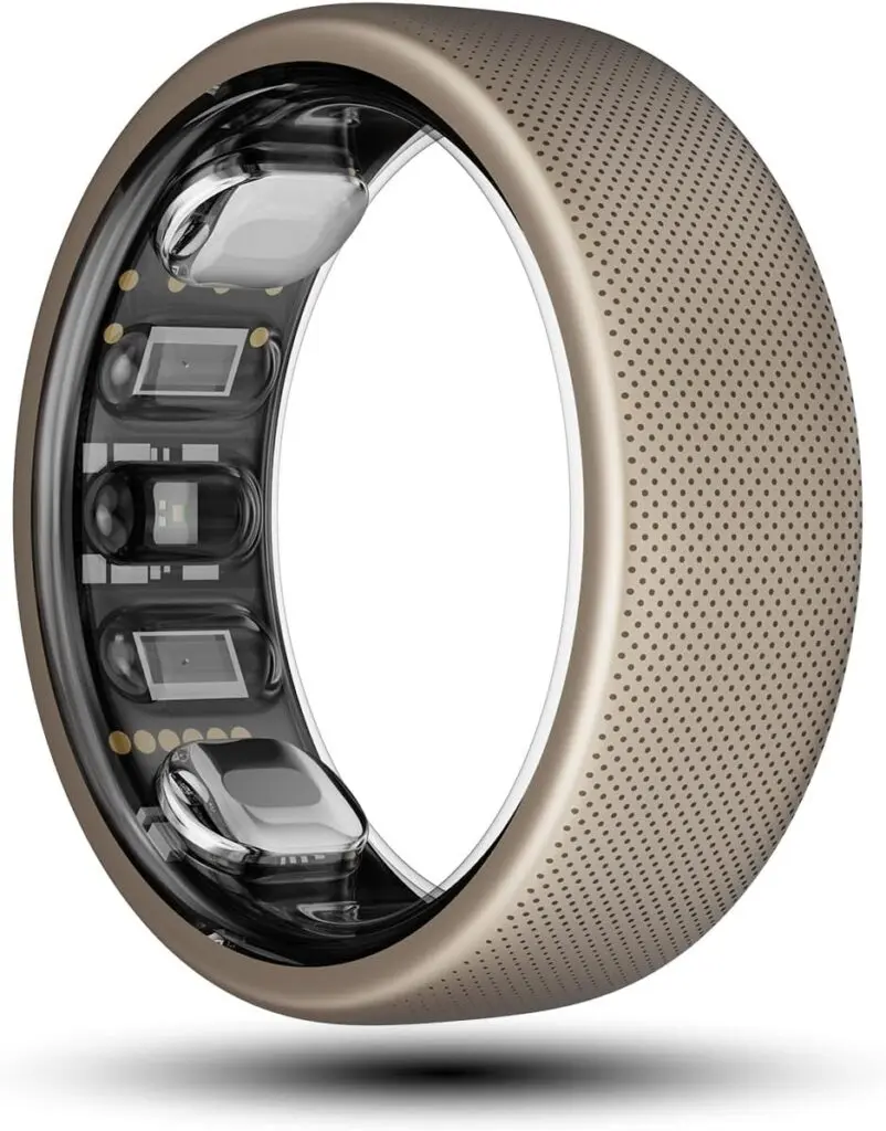 A light brown Amazfit ring with tiny dots all over the exterior sits against a white background. It's one of the leading smart rings.