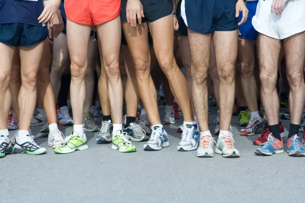 Runners on the start line of a race.