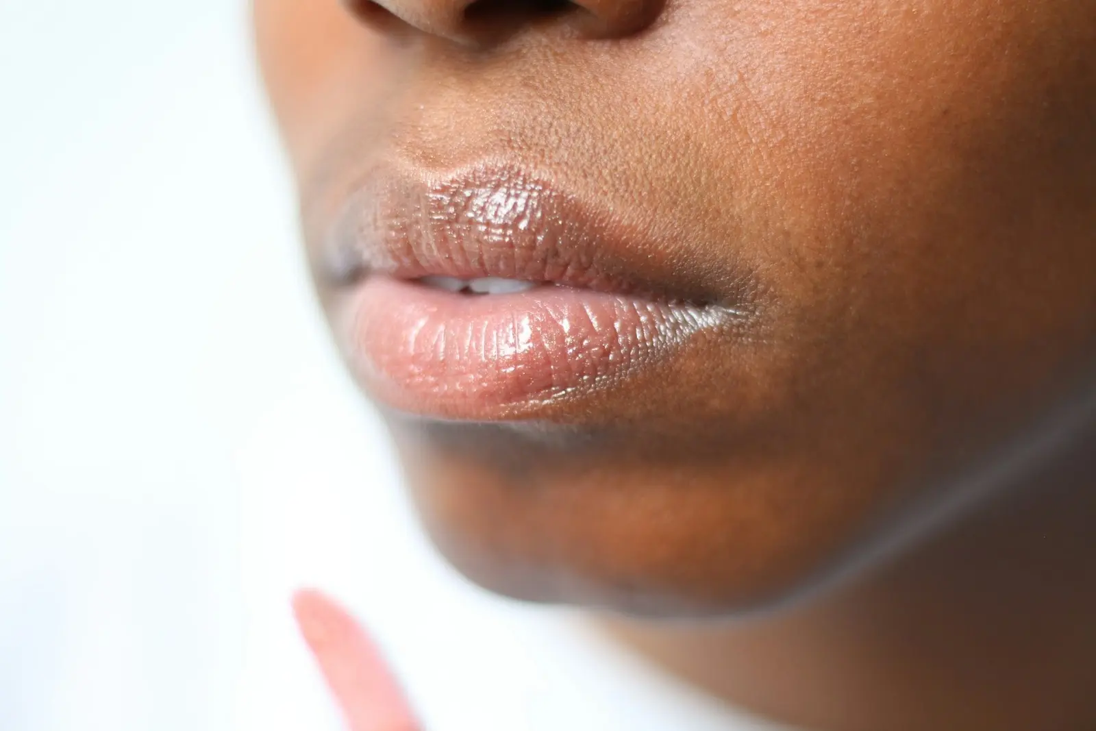 lip gloss on darker skin tones