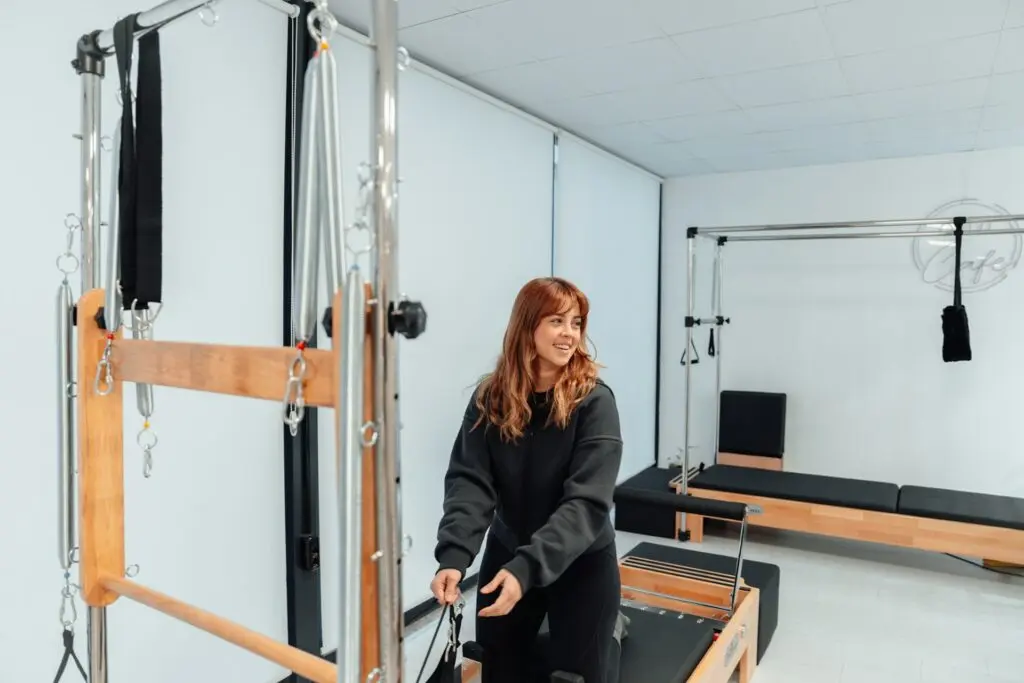 A girl on a reformer.