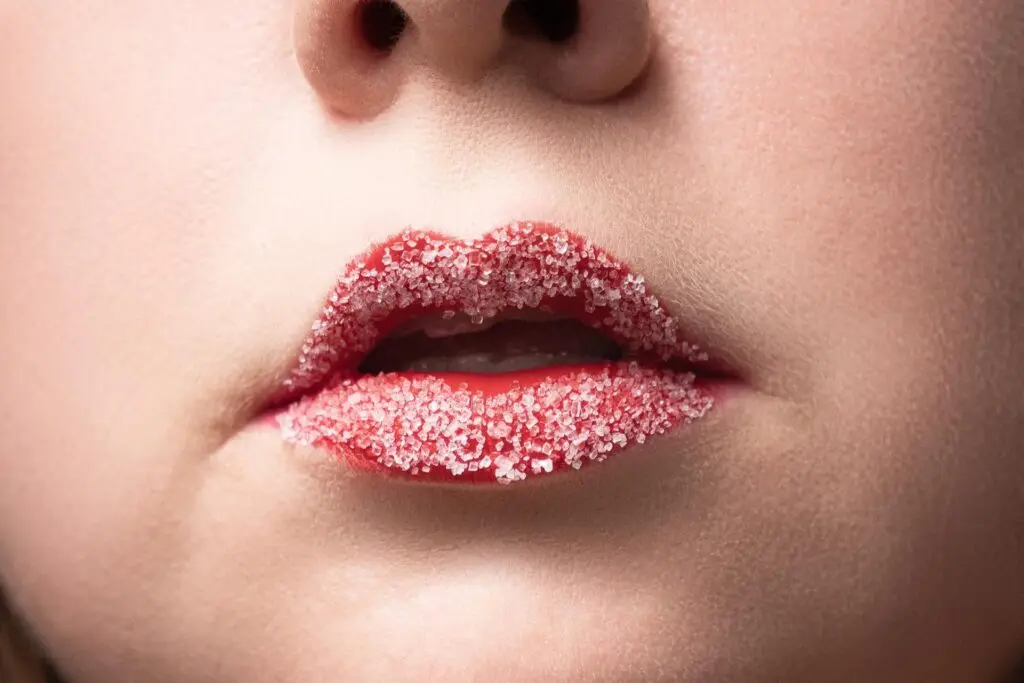 face with sugar on lips