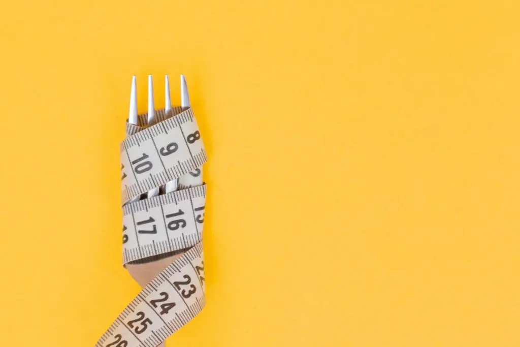 A fork and a measuring tape.