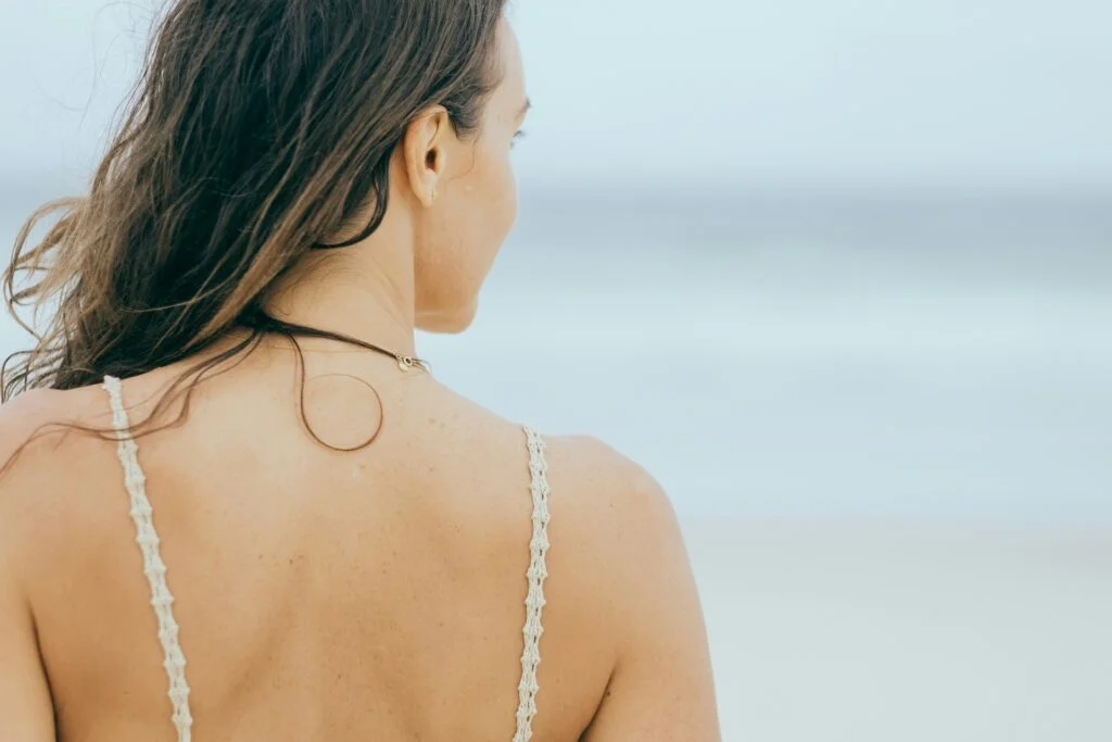 girl looking at the ocean