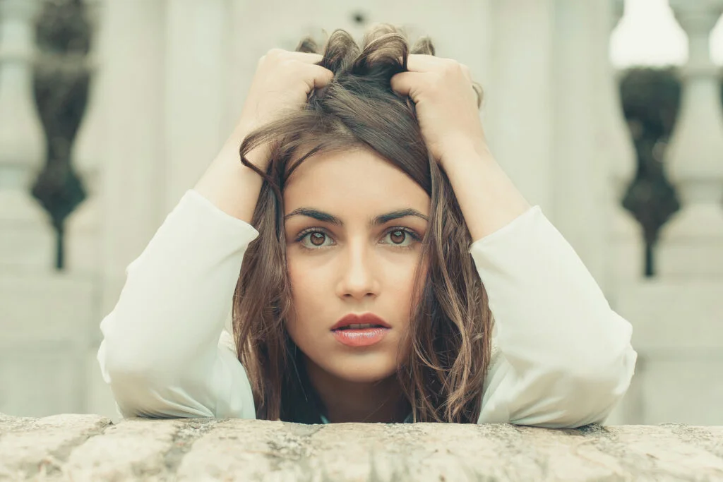 Learn how to get rid of greasy hair by understanding what causes it.