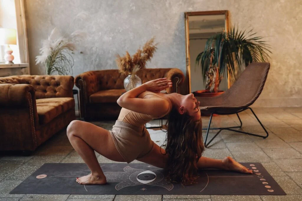 Woman in White Tank Top Lying on Floor