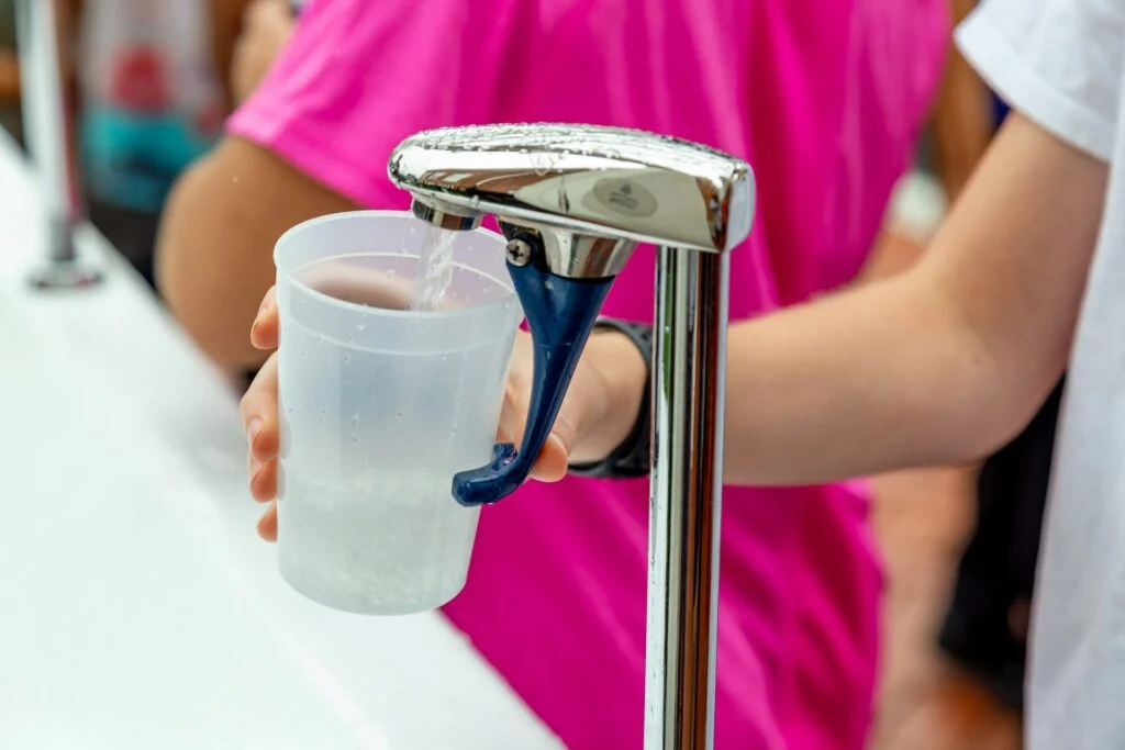 This young man was filling up a cup with fresh drinking water during a special program at our local Parks & Rec center.