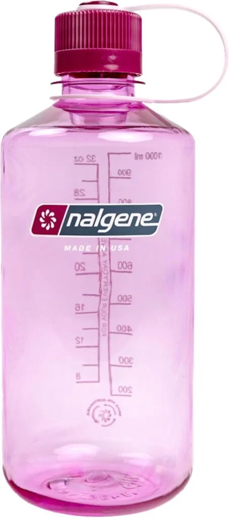A purple-pink Nalgene water bottle sits against a white background.