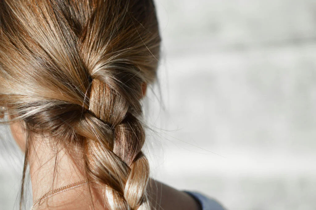 Long hair can be braided to protect it before sleep.