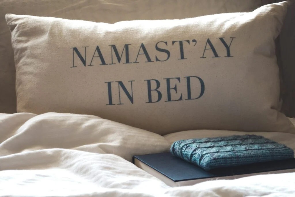 Pillow and journal on a bed