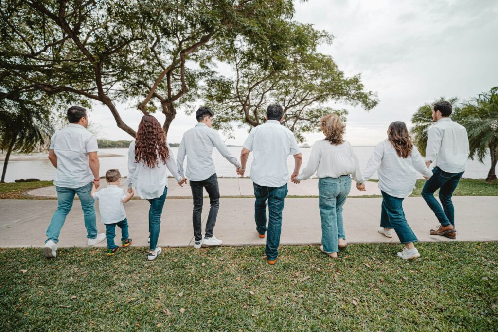 A multigenerational family with their backs to the camera