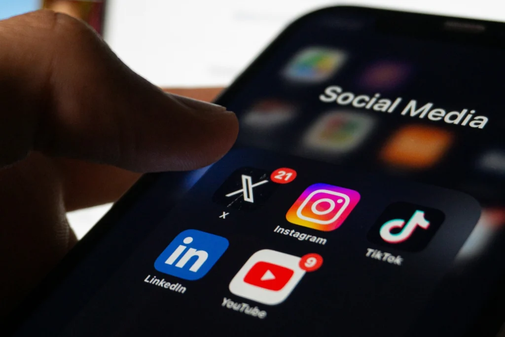 social media app folder on a phone screen