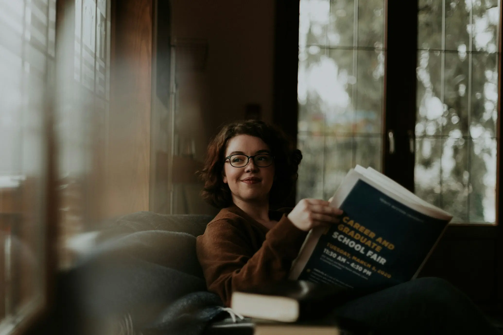 woman reading newspaper