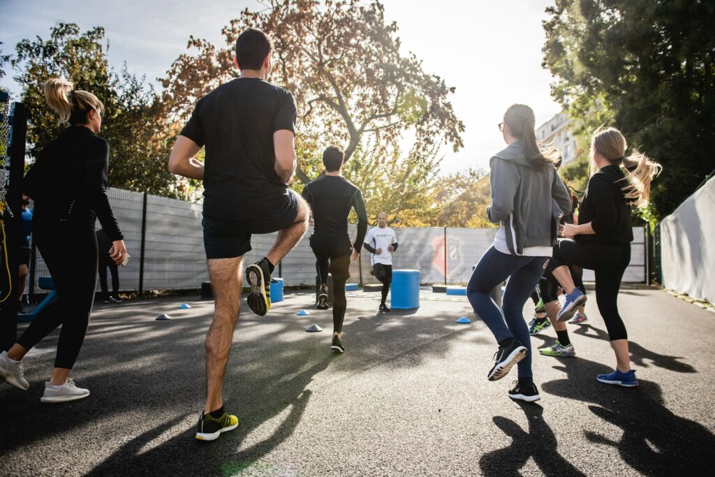 A group of runners warming up.