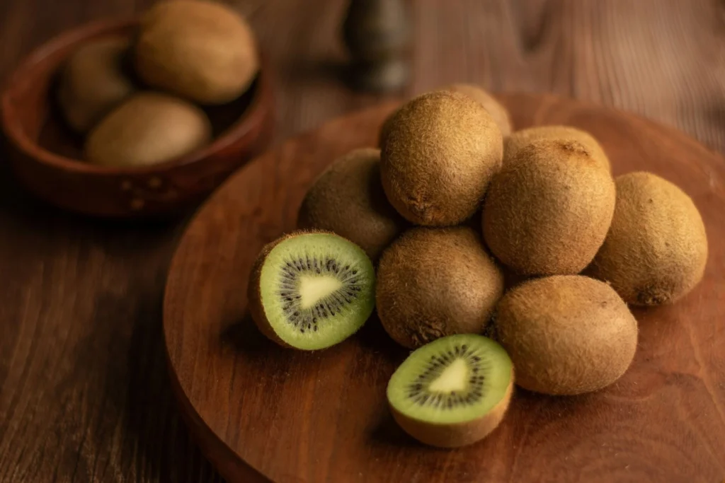 a bunch of kiwifruits on a table