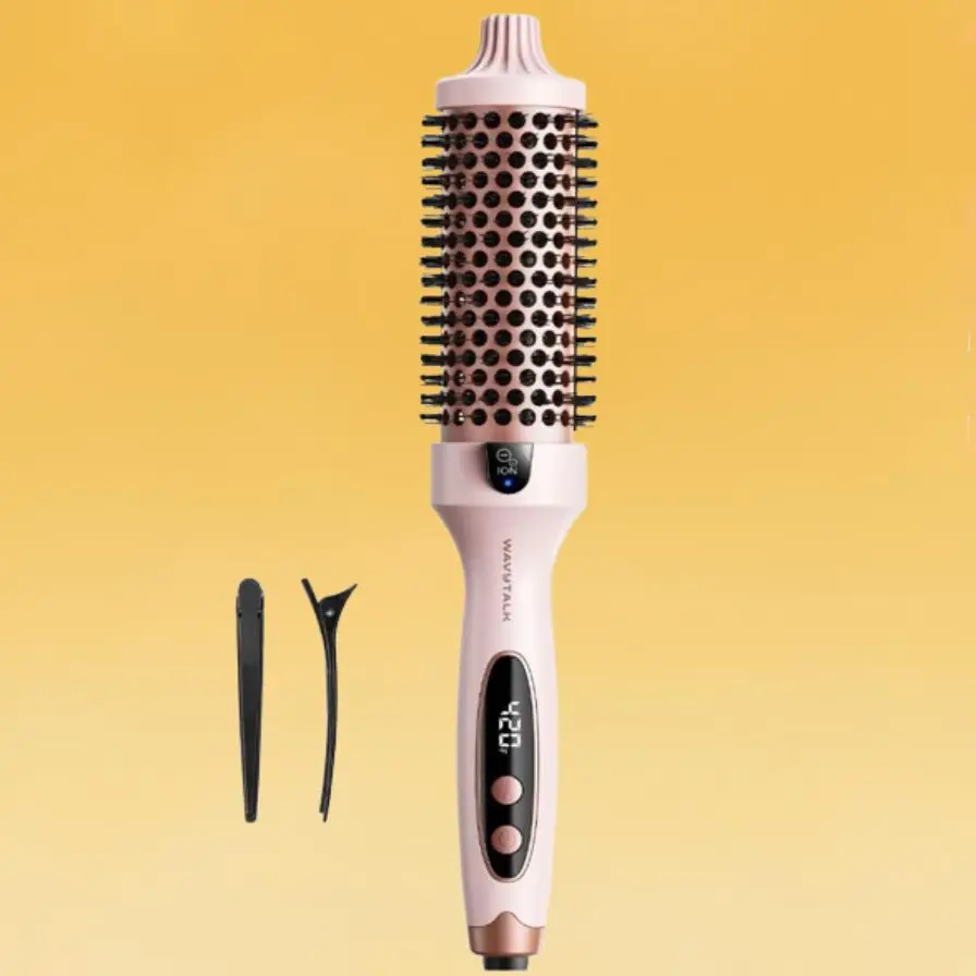 A Wavytalk thermal brush with a digital display showing 420° Fahrenheit and bristles. Nearby are two black hair clips.