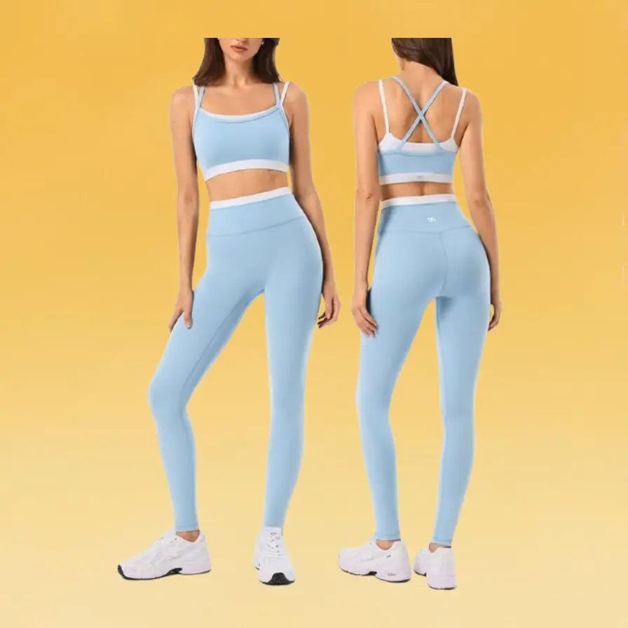 A woman wearing a sky blue sports bra and leggings