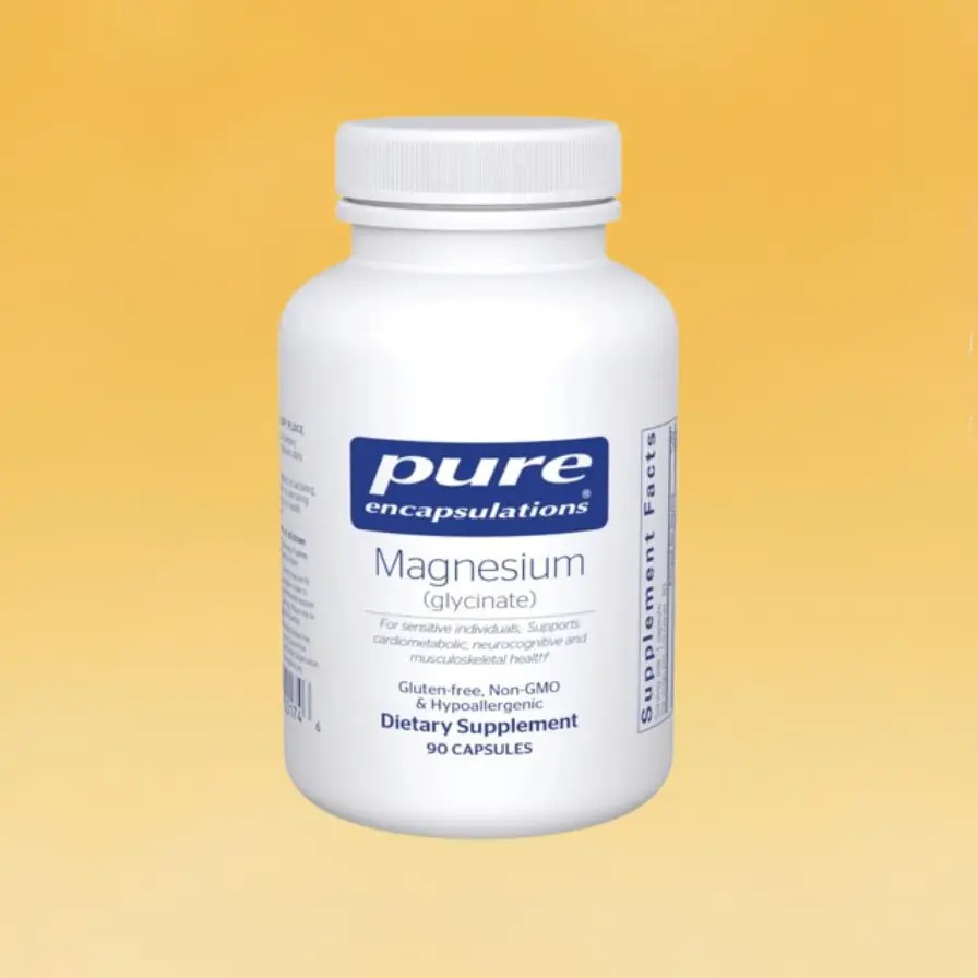 A white bottle of Pure Encapsulations magnesium glycinate supplement. The label highlights gluten-free, non-GMO and hypoallergenic features.
