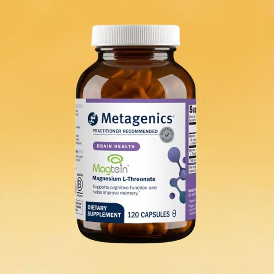 Brown glass bottle labeled Metagenics with white cap, containing 120 capsules. Label highlights Magnesium L-Threonate that supports cognitive function and memory support.