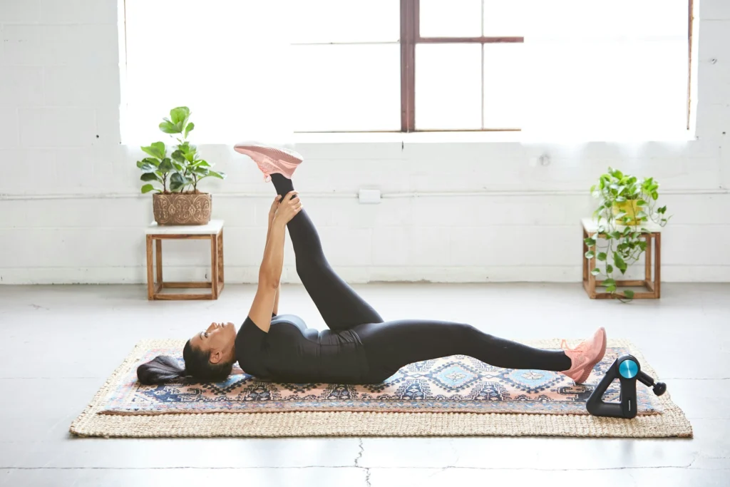 A woman stretching for recovery.