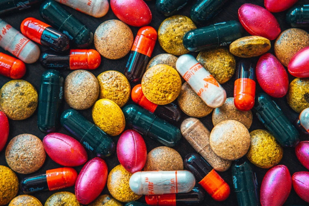 different shaped, sized and colored vitamins