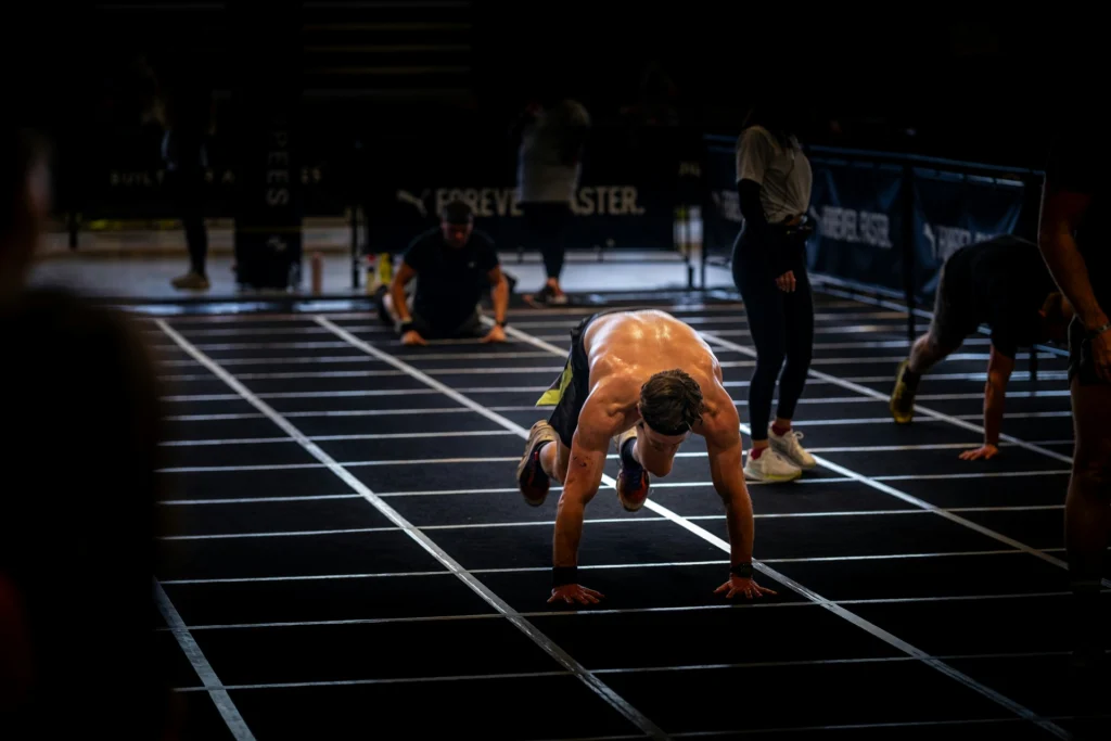 Manage your energy efficiently and determine the transition style that matches your fitness level to master burpee broad jumps.