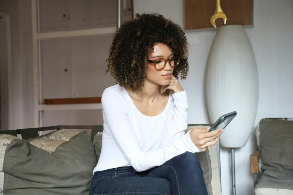 A woman looking at her phone