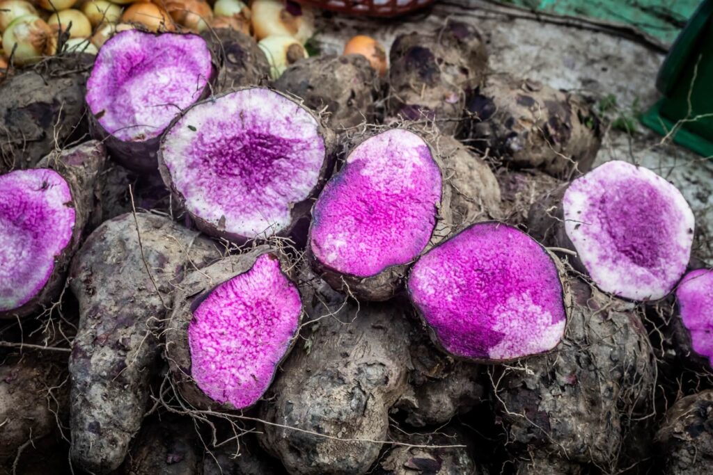 pieces of raw ube cut in half