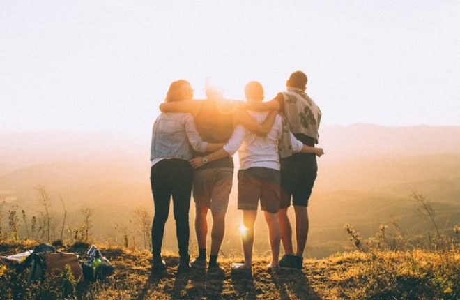 Friends watching sunrise