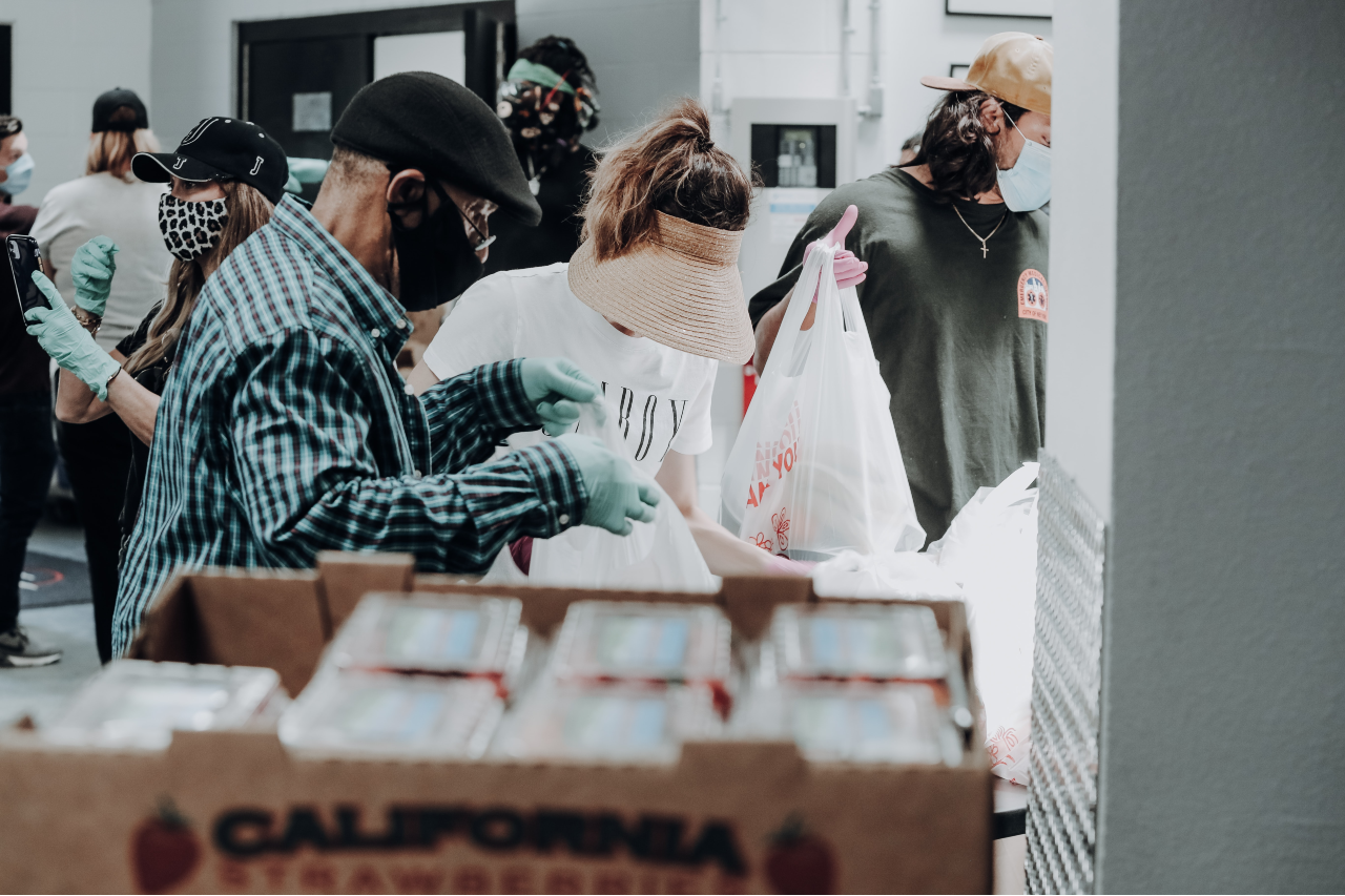masked volunteers at a food bank