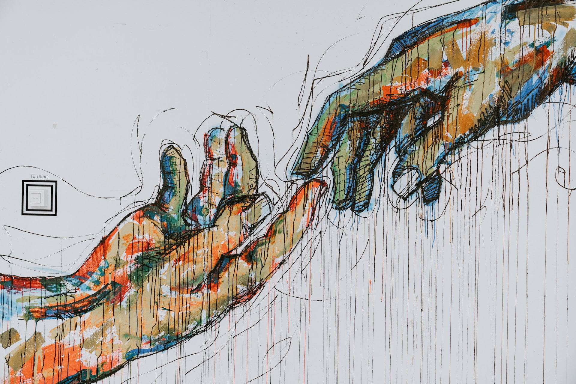 Artwork of Two Hands Reaching Out