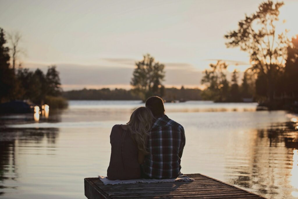 Couple Sitting on a Dock