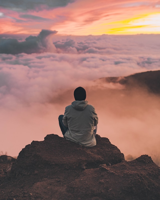 A man meditating on a cliff
Photo by Ian Stauffer on Unsplash