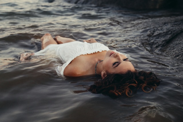 A woman floating in water and resting
Photo by Ryan Moreno on Unsplash